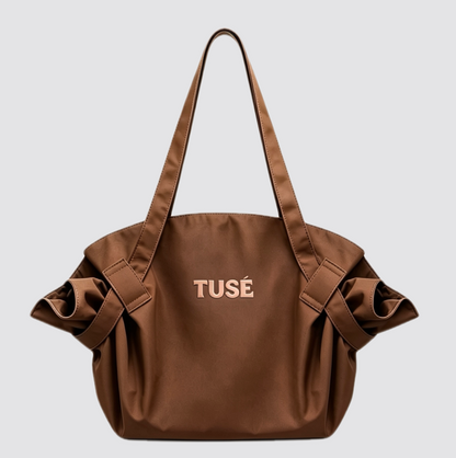 La Bolsa TUSÉ